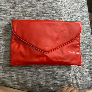 Red J crew clutch